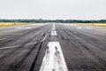Concrete asphalt airport runway in poor condition