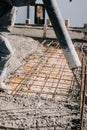 Concrete automatic pump tube working on construction site Royalty Free Stock Photo