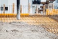 Concrete pump tube working on construction site. details of industrial machinery Royalty Free Stock Photo