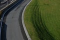 concrete barriers to protect a nice lawn cubes on a paved