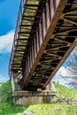 The concrete base iron railway bridge Royalty Free Stock Photo