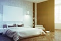 Concrete bedroom, white bed, poster side toned Royalty Free Stock Photo