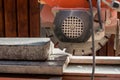 Concrete block and an angle grinder Royalty Free Stock Photo