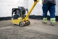 a concrete block cutter is being used to grind the floor Royalty Free Stock Photo