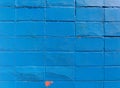 Concrete block wall painted bright blue