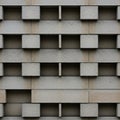 Concrete blocks are arranged in a geometric grid pattern, forming an architectural Royalty Free Stock Photo
