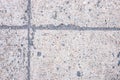 Concrete blocks with joints. Asphalt road top view. Old grungy concrete with stone pebble relief. Grungy concrete Royalty Free Stock Photo