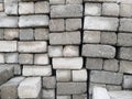 Concrete blocks piled on top of each other - stacks of cement bricks