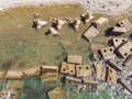 Concrete blocks and tetrapods on the beach. Top aerial view made by drone