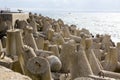 Concrete breakwaters piled on the seashore