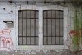 Concrete and bricks wall game texture with windows old house Royalty Free Stock Photo