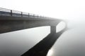 Concrete bridge in the middle of a deep fog