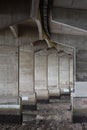 Concrete bridge pillars at low tide Royalty Free Stock Photo