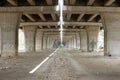 Concrete bridge pillars under tracks of highway