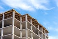 Concrete building under construction against blue sky Royalty Free Stock Photo