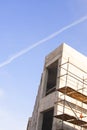 a concrete building under construction in the center of Moscow in the photo of the blue sky Royalty Free Stock Photo