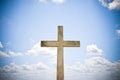 Concrete christian cross against a bright sky - concept image wi Royalty Free Stock Photo