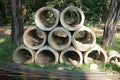 Concrete circle pit in grass on factory yard