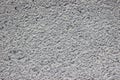 Concrete coating with impregnations of small stones texture