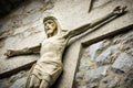 Concrete Crucifix of Jesus Christ on the wall of the Catholic Church, Croatia