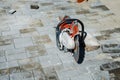 Concrete cutter machinery and cutting blade on a driveway Royalty Free Stock Photo