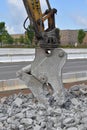 Concrete demolition hydraulic jaw on excavator