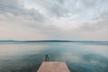 Concrete dock at seaside in sunrise