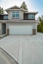 Concrete driveway of brand new residential triplex house