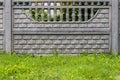 Concrete fence with decorative motifs Royalty Free Stock Photo