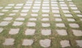 Concrete floor with green grass Royalty Free Stock Photo