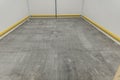Concrete floor grinder and sanded ready for application with resin coating Royalty Free Stock Photo