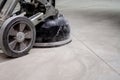 concrete floor grinding machine is an essential tool used to prepare the surface of a concrete floor before the installation of a