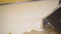 Concrete floor pouring special Fillable mortar. Self-filling floor. Contract painter painting garage floor to speed up selling of