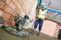 Concrete flooring. using walk-behind power trowel machine for surface floating Royalty Free Stock Photo