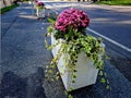 concrete flower pots form an obstacle at the crossing near the