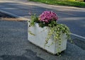 concrete flower pots form an obstacle at the crossing near