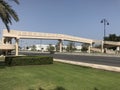 Concrete flyover across Muscat express highway tarmac roads at oman with less vehicles traffic due to corona virus pandemic and