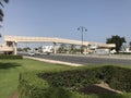 Concrete flyover across muscat express highway tarmac roads at Oman with less vehicles traffic due to corona virus pandemic and