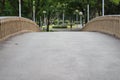 Concrete footbridge with artificial branch railing