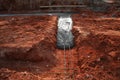 Concrete footer being poured