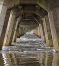 Concrete foundation pilings of Tolaga Bay Wharf NZ Royalty Free Stock Photo