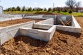 concrete foundation with reinforcement and metal slab construction site, process of house building Royalty Free Stock Photo