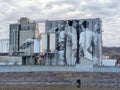 Concrete Grain Elevators with Artwork Painted on Them Royalty Free Stock Photo