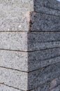 Concrete or granite gray square pavement slabs or stones for floor, wall or path stacked. Industry manufacturing or building conce Royalty Free Stock Photo