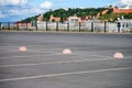 Concrete hemispheres parking limiter. Protection from car parking. Elements to restrict access to parking zone and control Royalty Free Stock Photo
