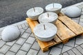 Installation of concrete hemispheres on the sidewalk