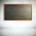 Concrete interior with chalkboard Royalty Free Stock Photo