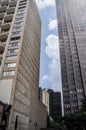 Concrete jungle with a sky gap between the buildings