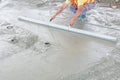 Concrete is leveling after pouring Royalty Free Stock Photo