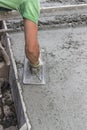 Concrete leveling with trowel Royalty Free Stock Photo